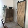 Loft deur staal en eikenhout